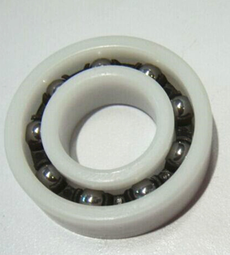 What is the correlation between the load characteristics of automotive power steering pump bearings and working pressure?